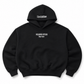 A black pullover hoodie with white printed text on the chest and inside the hood, displayed against a clean white background.