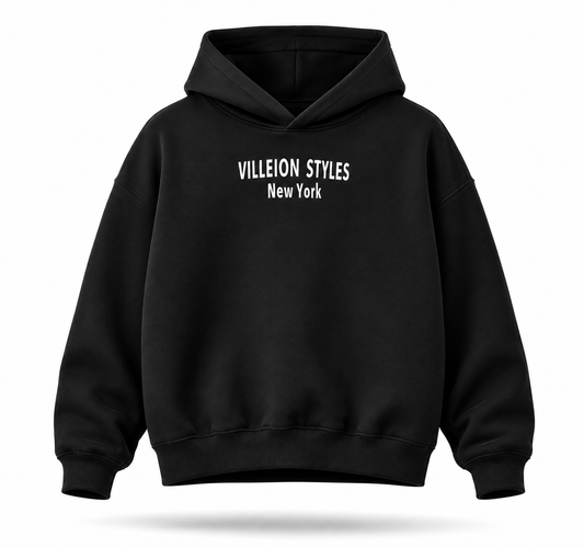 A black pullover hoodie with 'VILLEION STYLES New York' printed in white text on the chest, displayed on a clean white background with a soft shadow underneath.