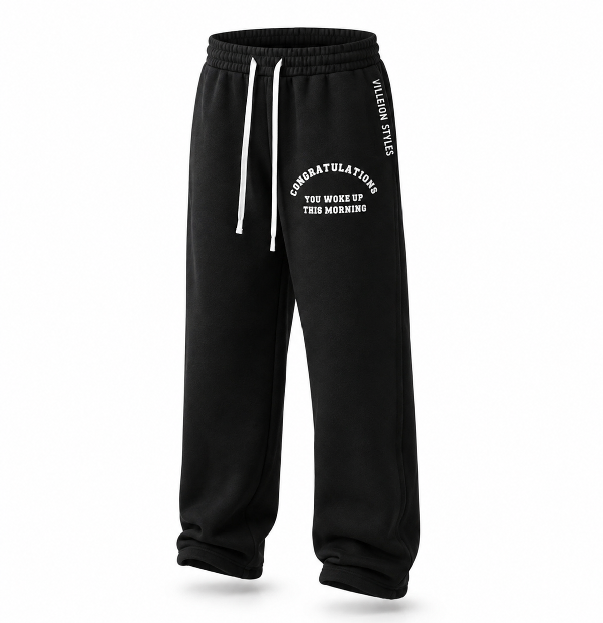 Black sweatpants with white drawstrings and white printed text on the left leg and side, shown on a clean white background.