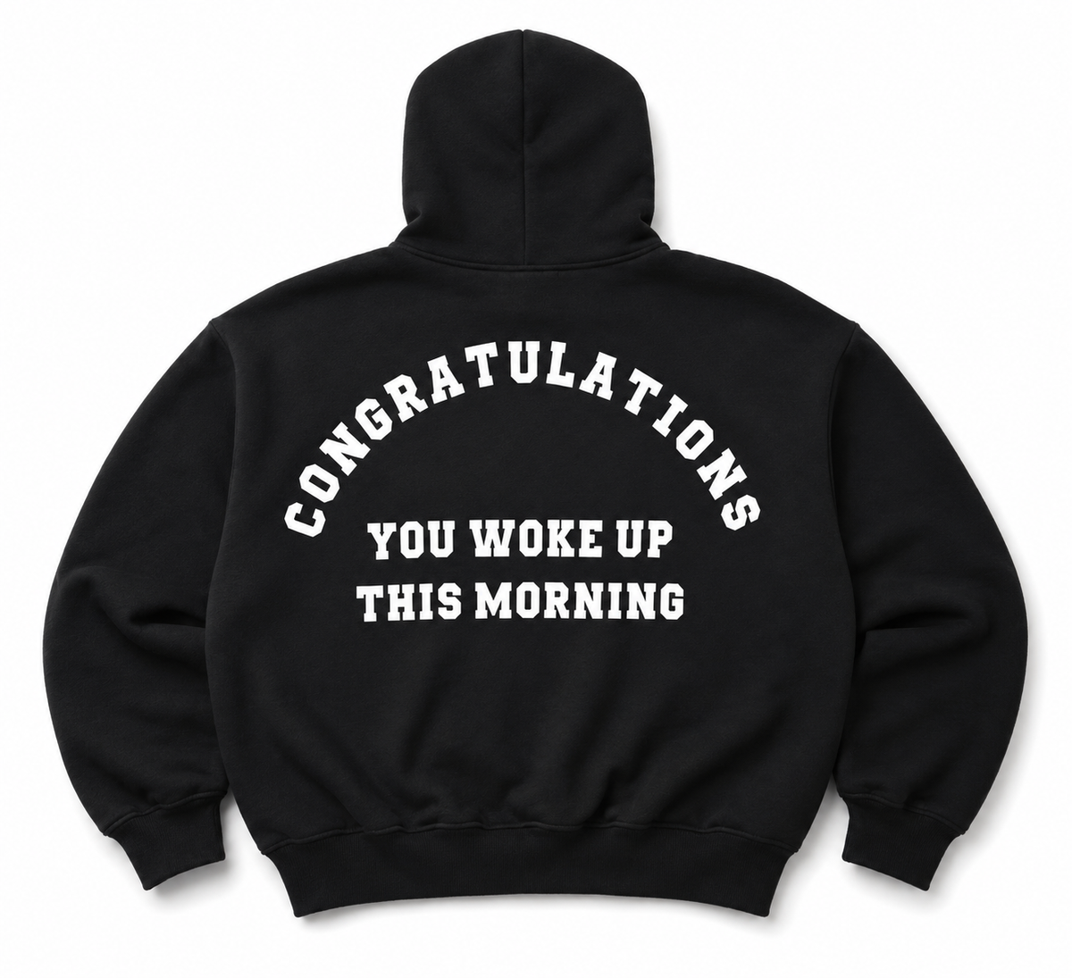 A black pullover hoodie shown from the back, featuring the phrase 'CONGRATULATIONS YOU WOKE UP THIS MORNING' printed in white arched text across the upper back.